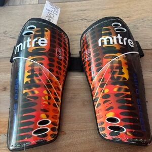 Mitre Kids Shinguards in Orange/Red